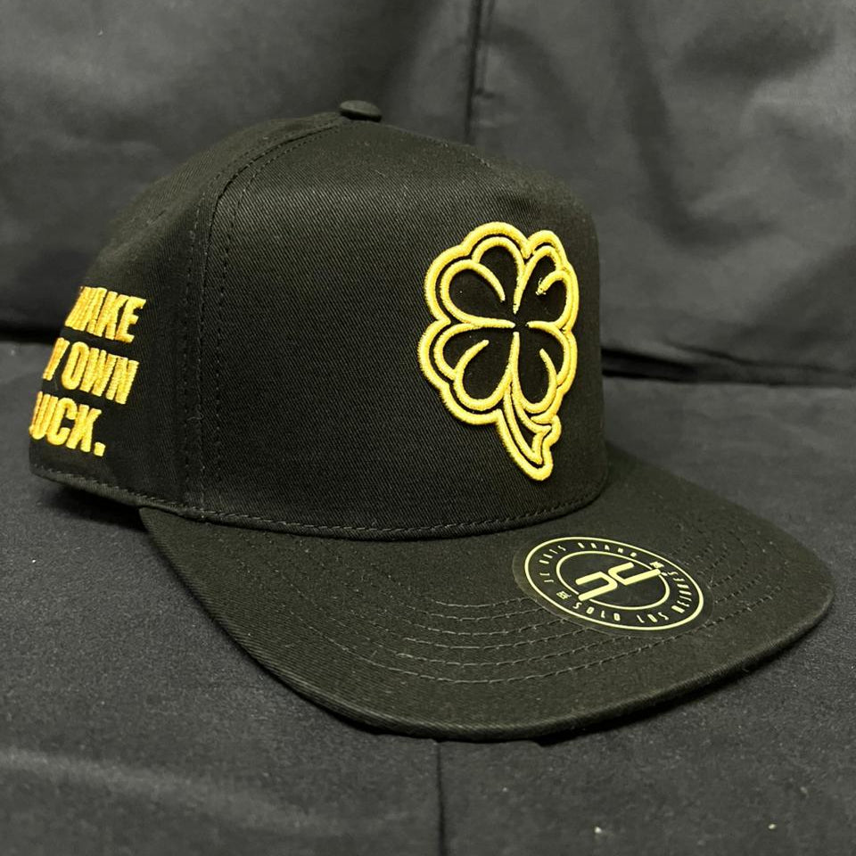 TREBOL NEGRO CON DORADO PLANA JC HATS